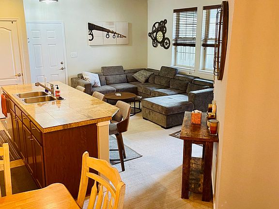 Large dining table and eat in Kitchen.