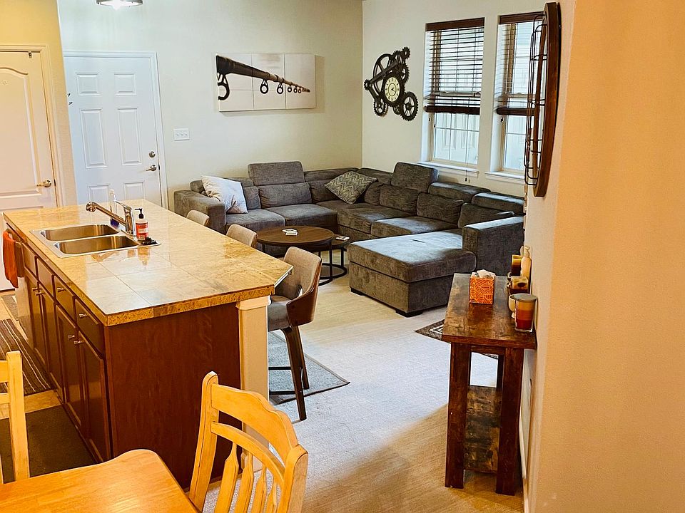 Large dining table and eat in Kitchen.