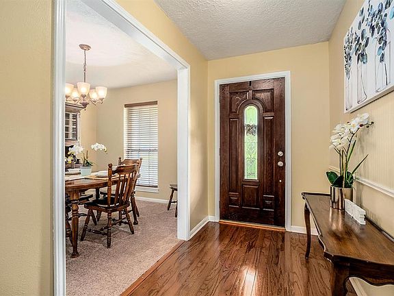 Upon entry you are greeted with hardwood floors