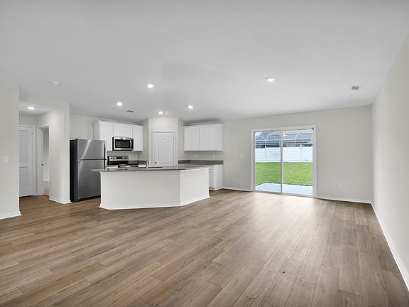 Never miss a moment in the open concept entertainment area