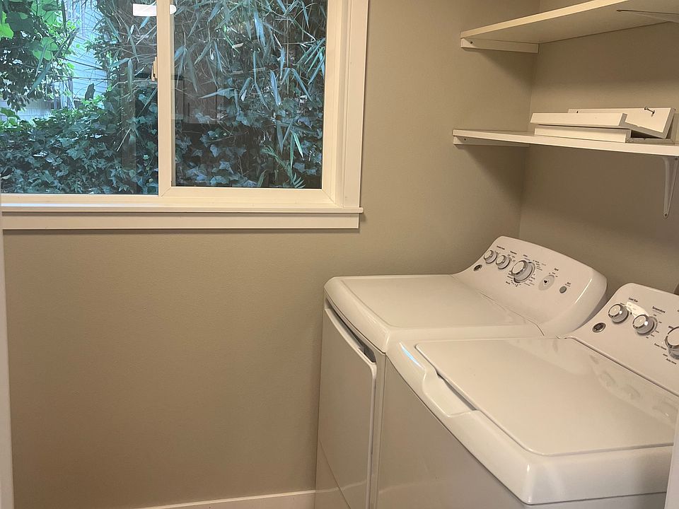 The interior laundry room door is the entry to the kitchen
