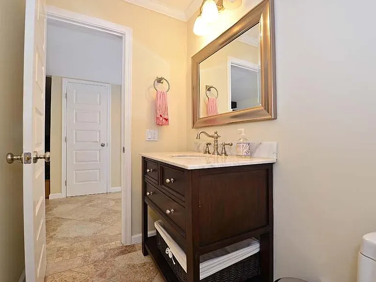 Entry Guest Half Bath Across from Garage Entry