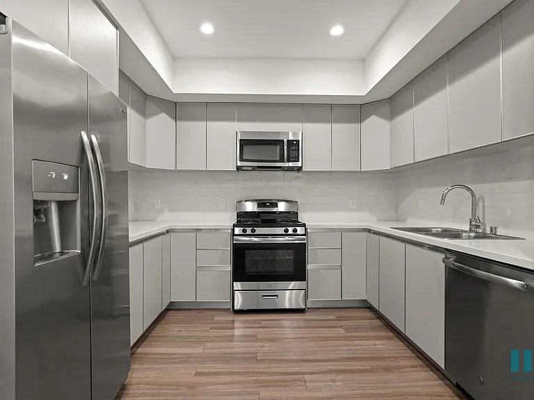 Large-Size Kitchen with Energy-Efficient Appliances and Ample Cabinet Storage