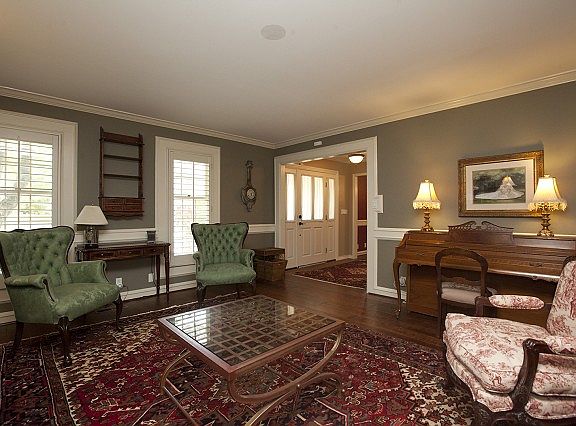 Hardwood floor and plantation shutters