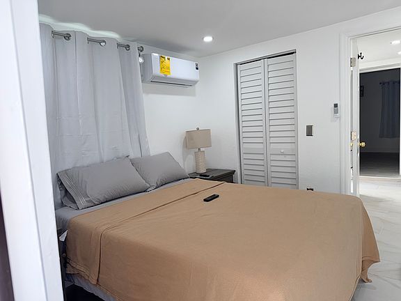 Queen bedroom 1 with closet and separate entrance