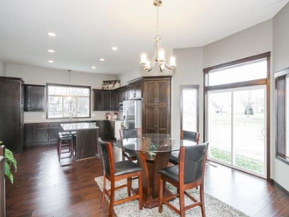 Spacious open floor plan, with beautiful upgraded laminate floors!  The kitchen  has many cabinets with 2 pantries!