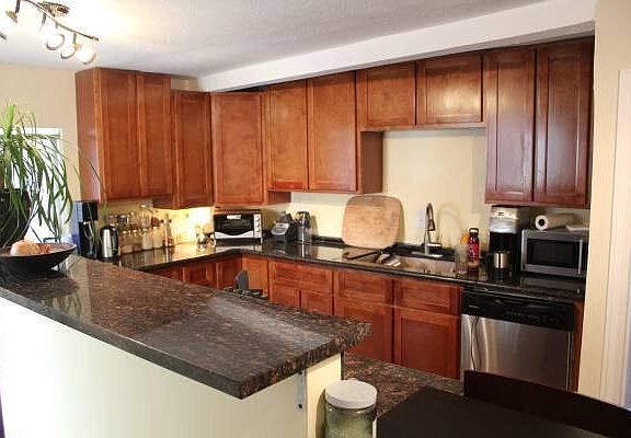 Kitchen has granite countertops