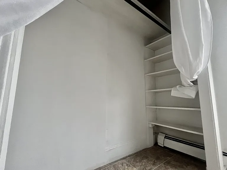Bathroom, large closet with shelving