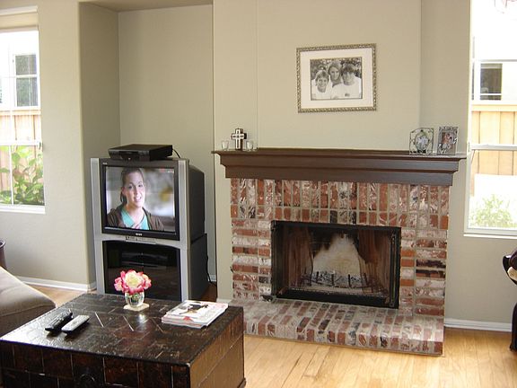 Cozy family room with brick fireplace
