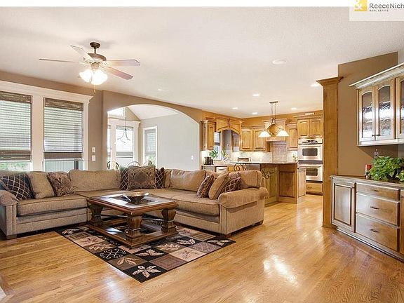 Open kitchen and family room provide a cozy atmosphere.  Beautiful crown molding is throught the home.