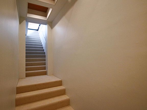 Private staircase within the home (from the 6th floor leading to the 7th and private floor)