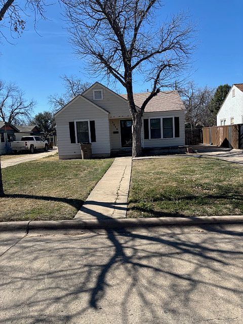 Front of house and yard
