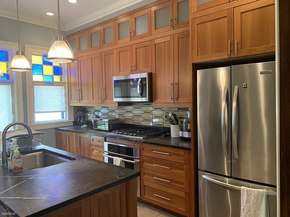 Kitchen, showing fridge, stove, microwave, and island with s