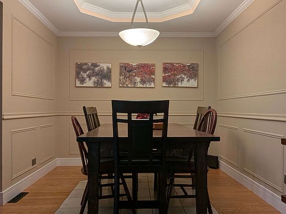 Designated dining area with an opening into the kitchen and living room - can be made into a playground paradise