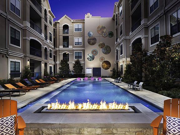 NEW: Enhanced salt-water pool and fire feature with lounge seating