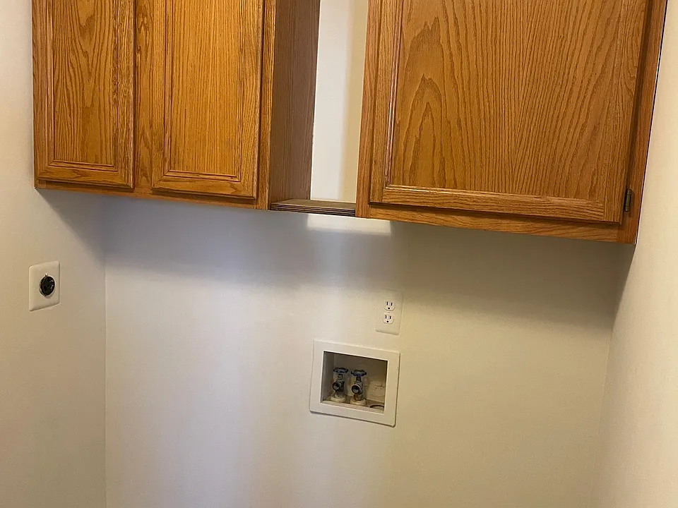 First floor laundry with washer and dryer included (not shown)
