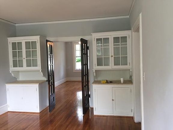 Dining room built-ins looking into den