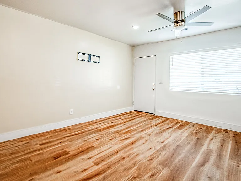 Family Room: TV Mount & Ceiling Fan, LED Lighting, LVP Flooring, Central Heating & Cooling, New Windows.