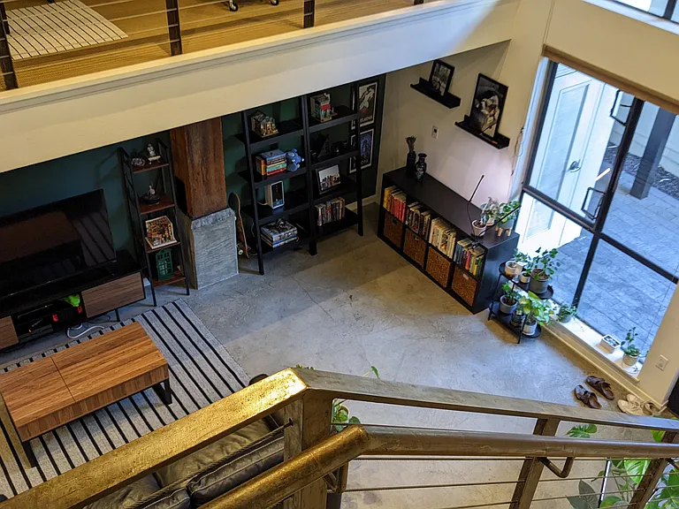 Going upstairs, looking down into living room