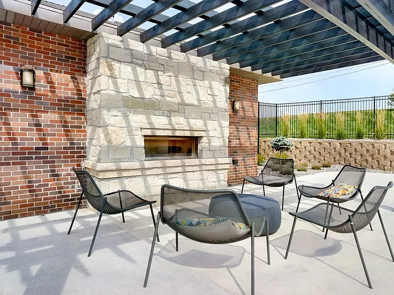Gather with some friends around our cozy outdoor fireplace.