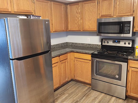 Kitchen Stainless Steal appliance granite tops