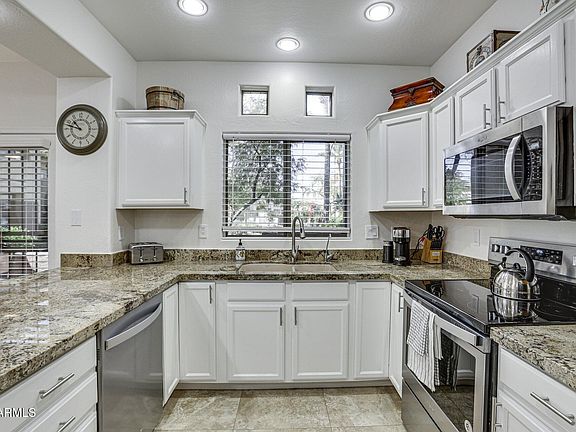 5th image of 9100 E Raintree Dr Unit 130