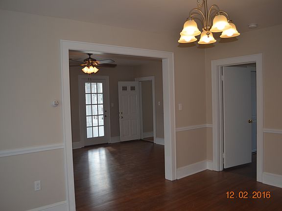 Dining Room (Living Room & Sun Porch in background)