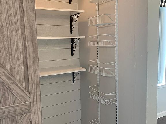 Pantry in closet with laundry