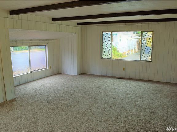 Enclosed gated area beside front porch.