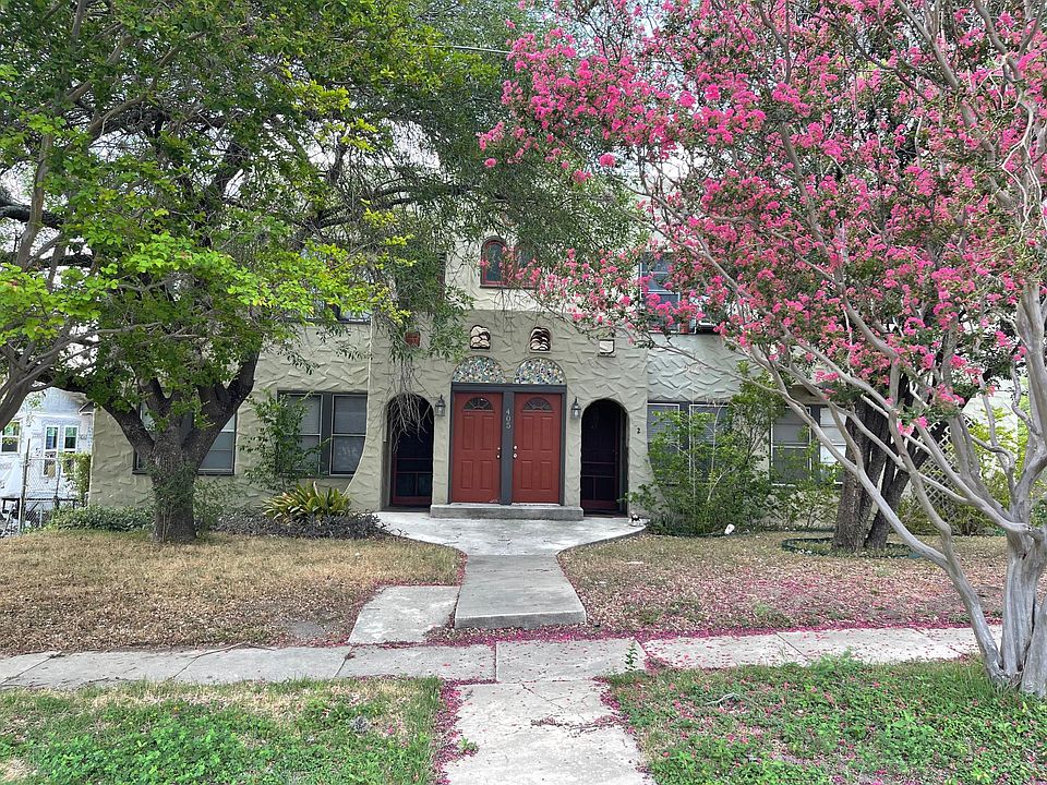 cute hacienda style building with original wood floors