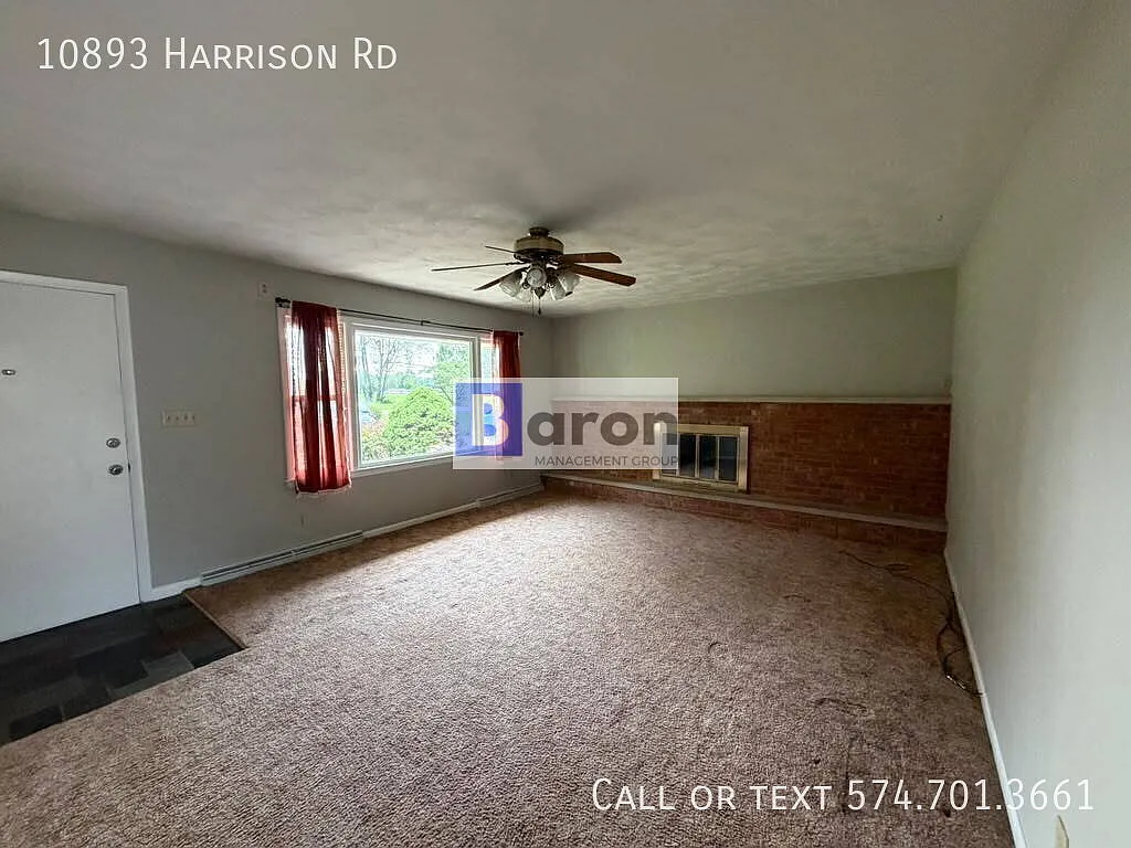 "Charming 3-Bedroom Home with Scenic Views at 10893 Harrison Rd — Photo 3