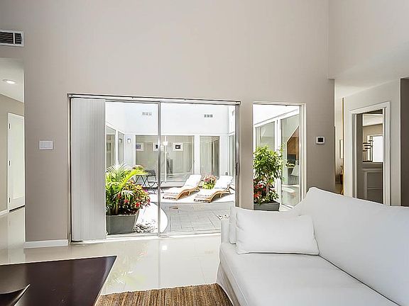 This atrium floods the home with natural light throughout!