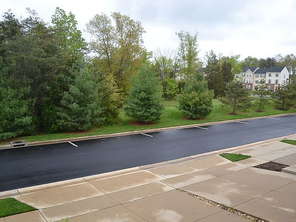 View to quiet street. Garage, driveway & street parking