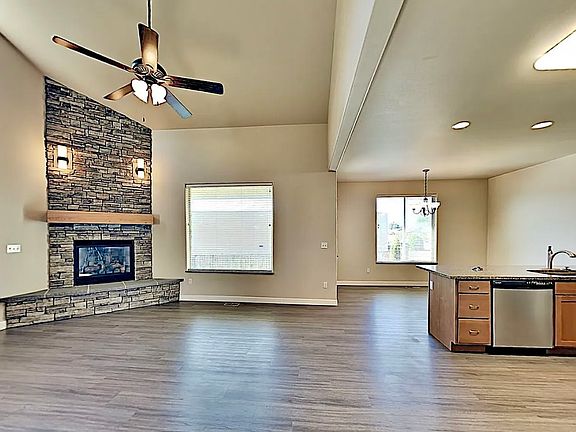High ceiling living room with gas fire place