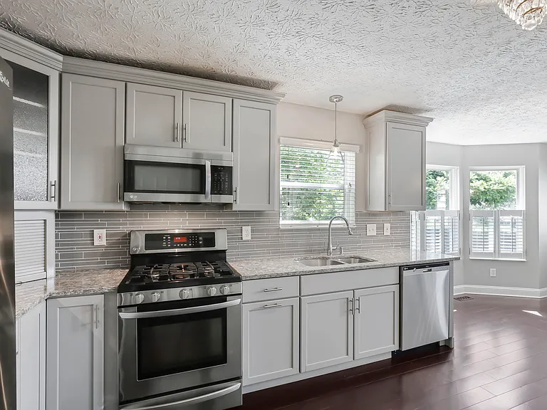 4392 Greensbury Dr — Photo 26