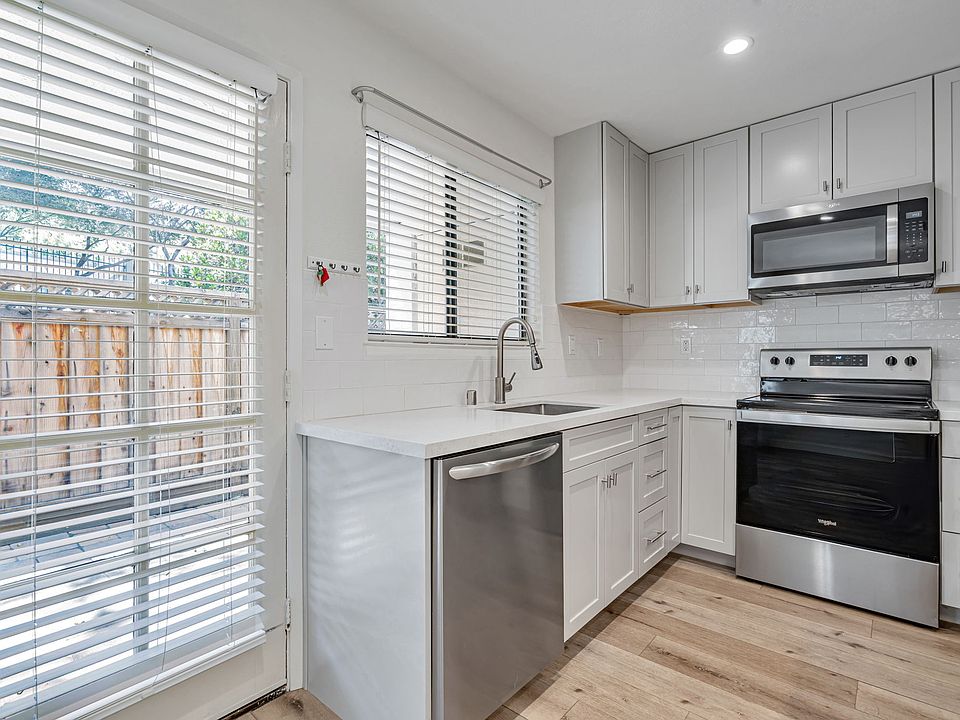 recently remodled kitchen with quartz counters and newer appliances