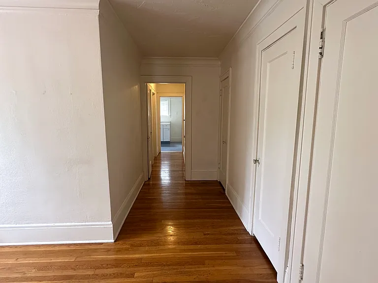 hallway _ passes the bedroom, bathroom and leads to kitchen