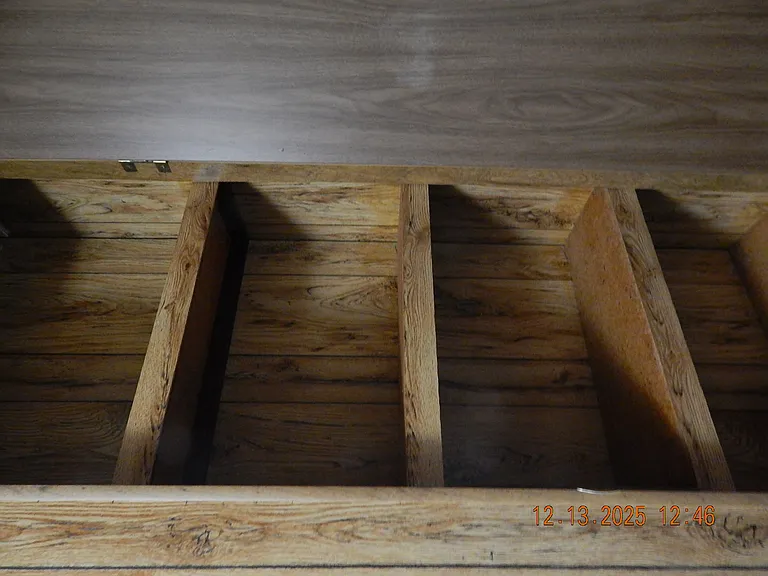 Linen cabinet -photo taken sideways to show actual shelving
