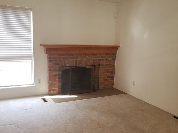 Living room with working fireplace