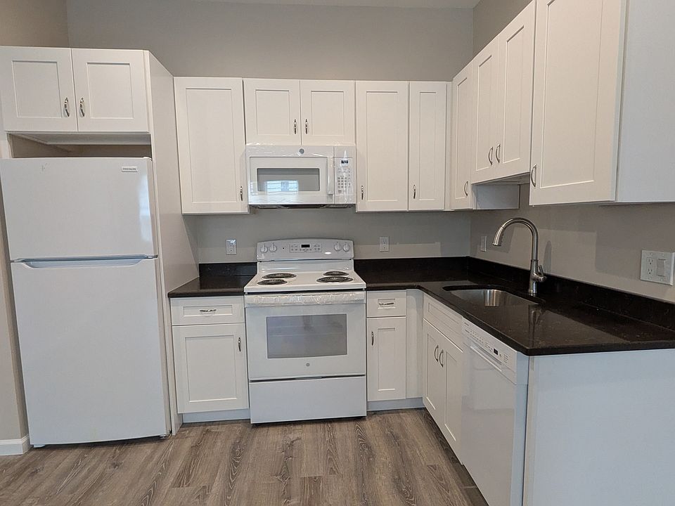 Brand new kitchen with high-efficiency appliances (refrigerator, stove/oven, dishwasher, microwave)