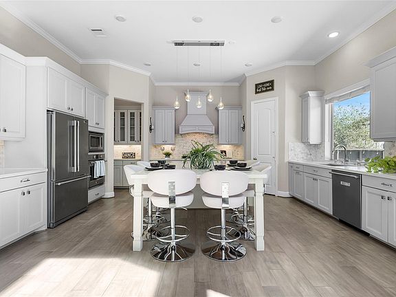 5th image of 6411 Tarrion Bay Lane