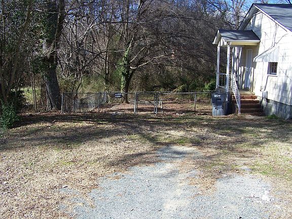 Left Side w/ Driveway