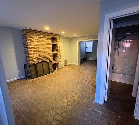 Open living area with bay window