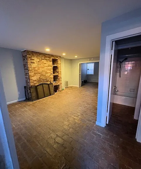 Open living area with bay window