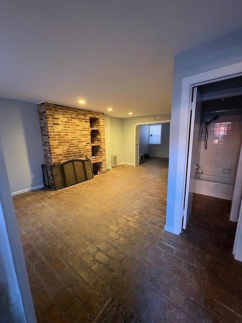 Open living area with bay window