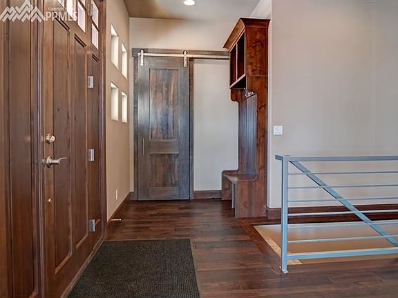 Front entry with spacious coat closet and bench