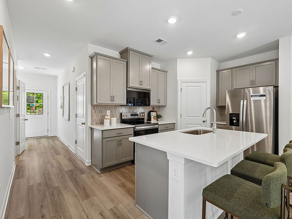 Cook your favorite meals in the sleek, modern kitchen.