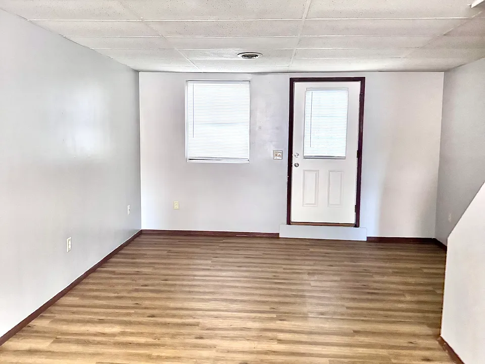 24 Locust St Apt 3 - Living Room & Doorway to private tree lined porch area