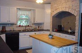 Lovely Brick Arch Cook Center