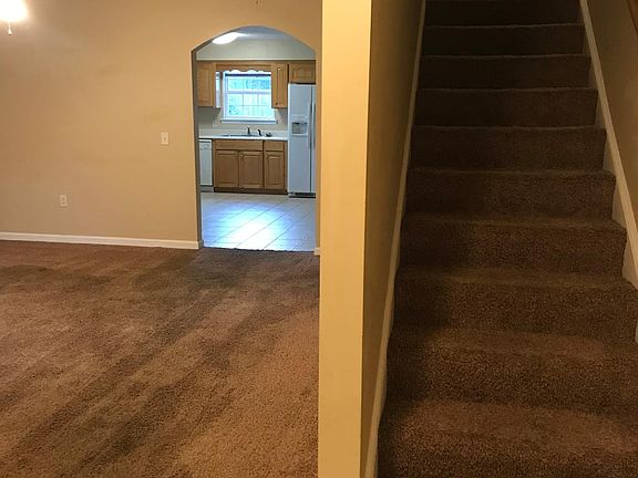 Living room Kitchen Stairs to upper level